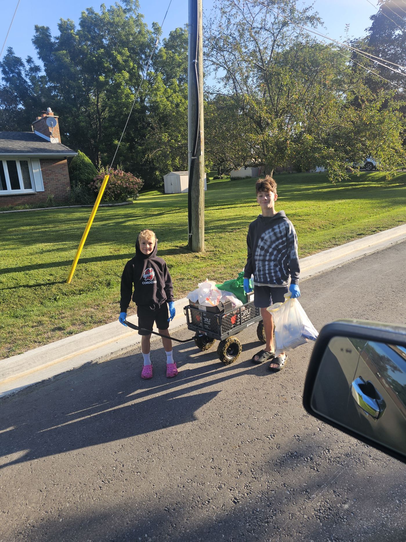 Clippers players collecting empties door to door